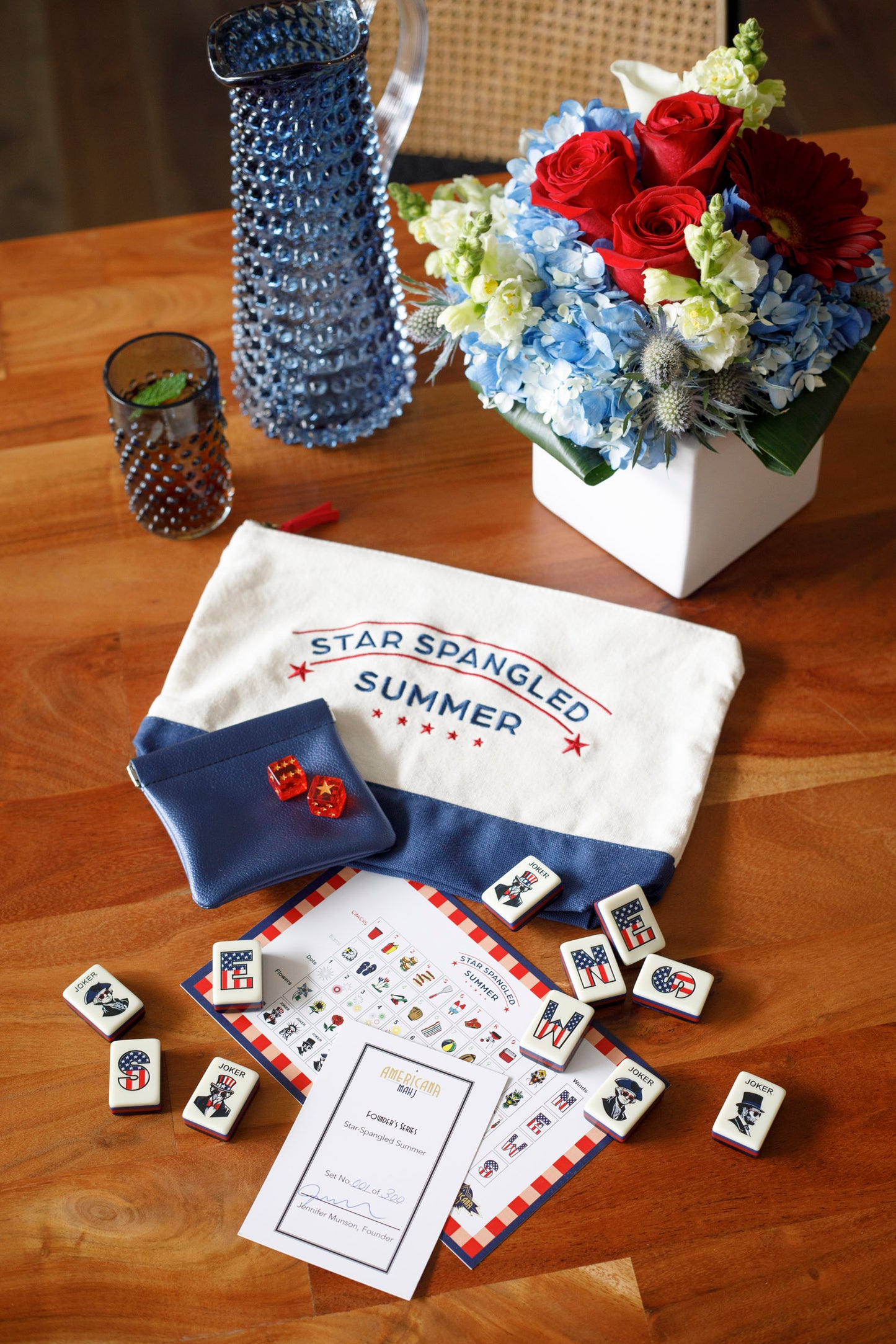 what's included: Tiles, Dice, Cards, bag, and founder's note